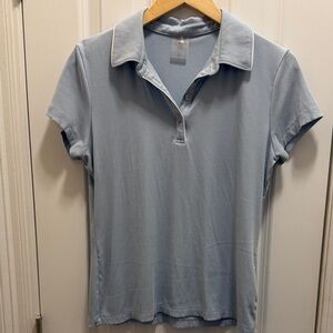 CALIA by Carrie Underwood Light Blue golf polo.